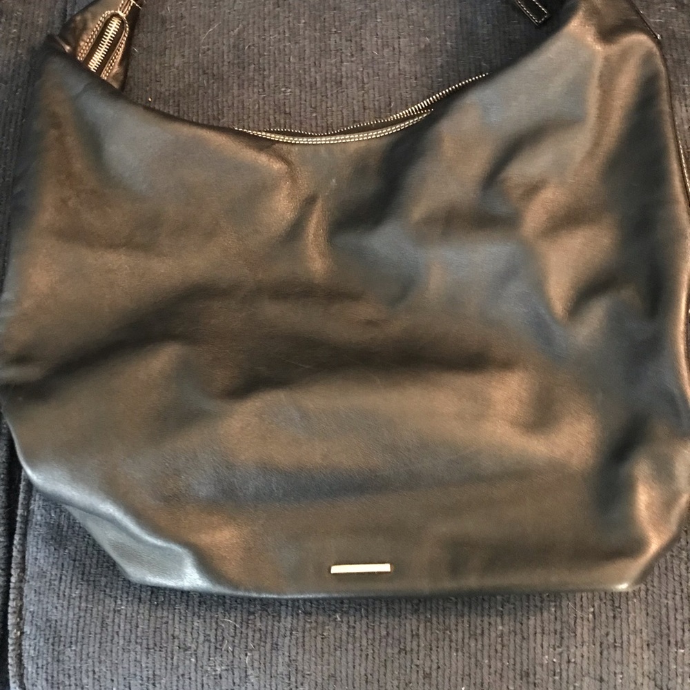Gucci Hobo. Originally 3200. Asking 1200. 15 years old. Kept in bag. Excellent.